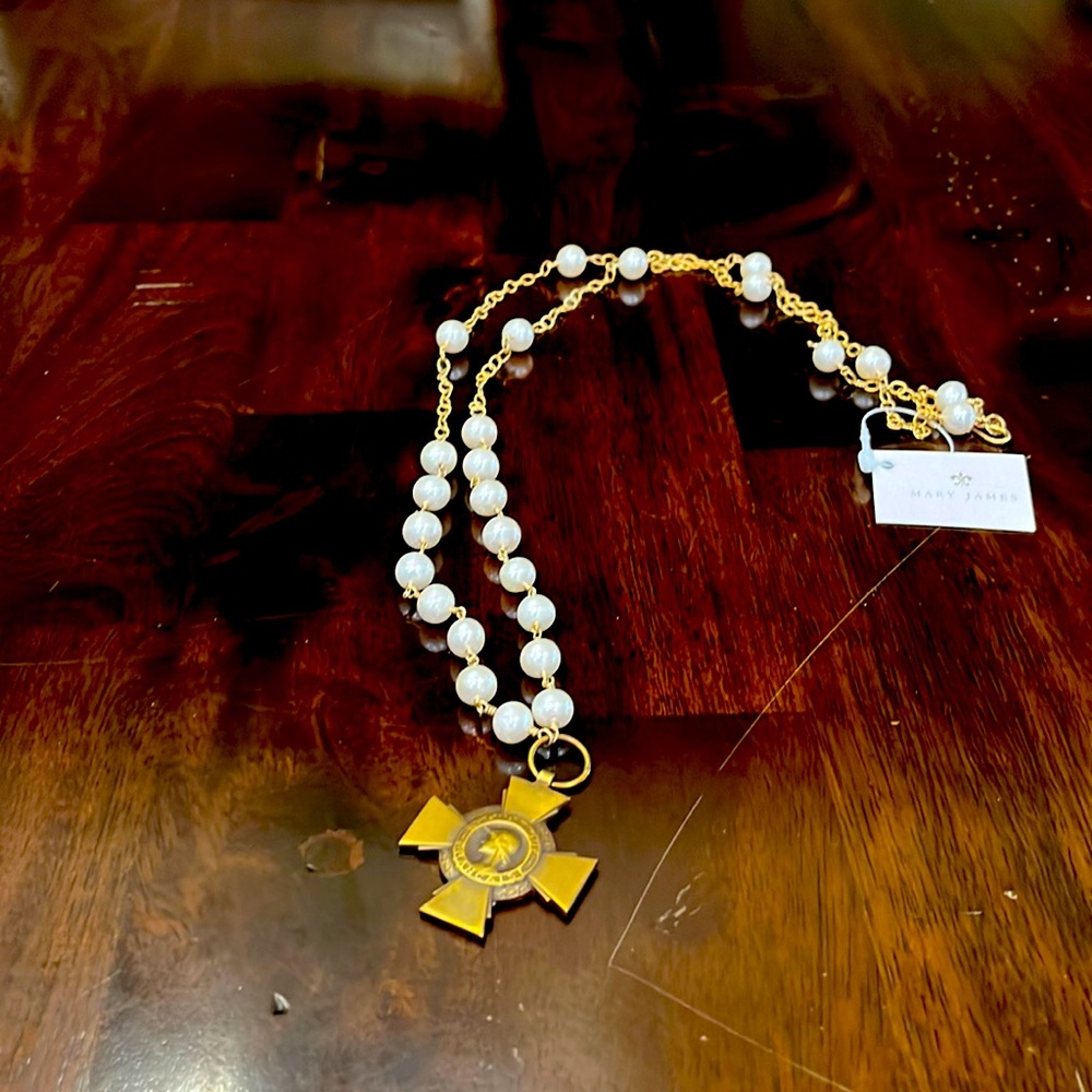 Mary James combatant cross